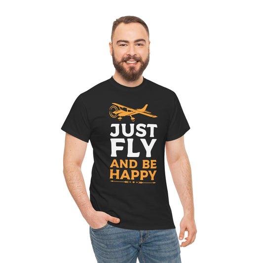 Black short-sleeved t-shirt with an orange airplane illustration and white and orange text "JUST FLY AND BE HAPPY".