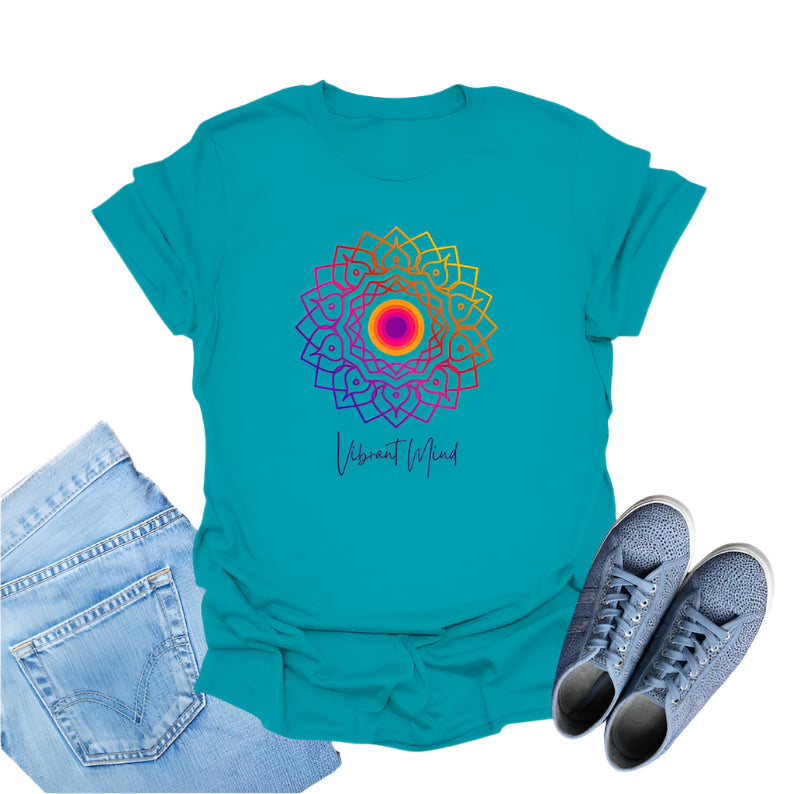 Kelly Green t-shirt displays a colorful gradient mandala graphic and the text "Vibrant Mind" in cursive.