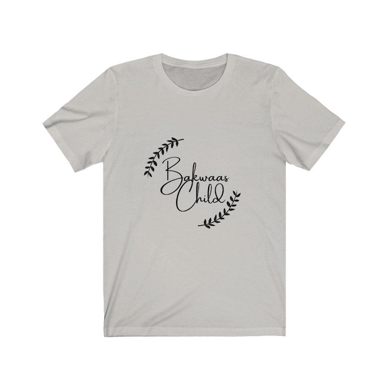 Light Grey t-shirt featuring the text "Bakwaas Child" in a stylish font, accompanied by leaf graphics.