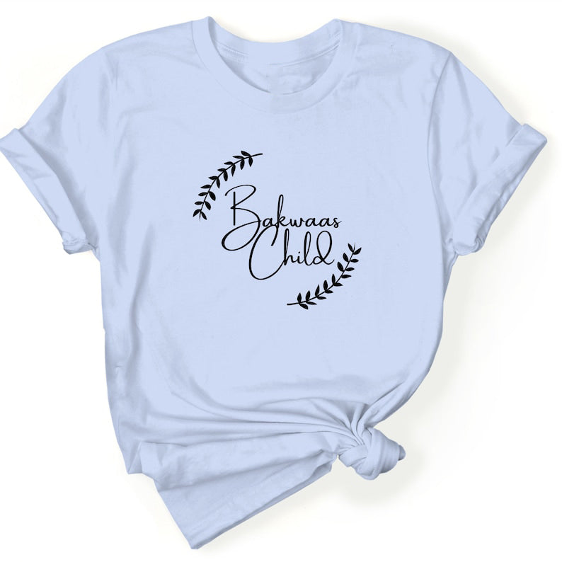 Light Indigo t-shirt featuring the text "Bakwaas Child" in a stylish font, accompanied by leaf graphics.