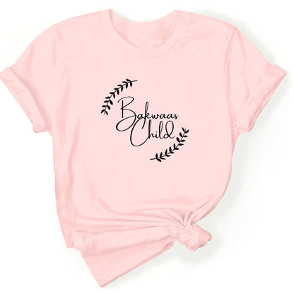 Light Pink t-shirt featuring the text "Bakwaas Child" in a stylish font, accompanied by leaf graphics.