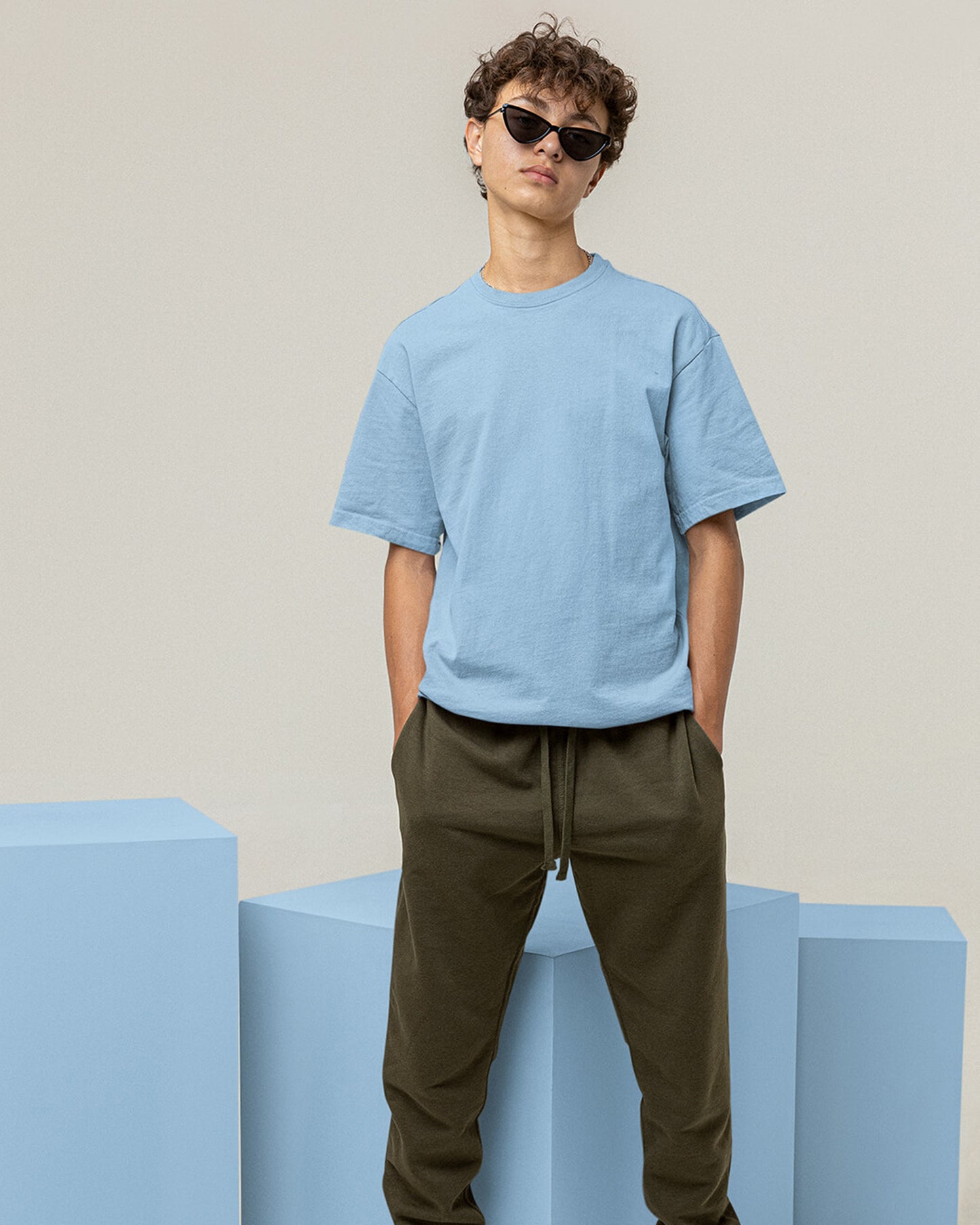 Man in Light Blue Oversized T-Shirt with Front View.