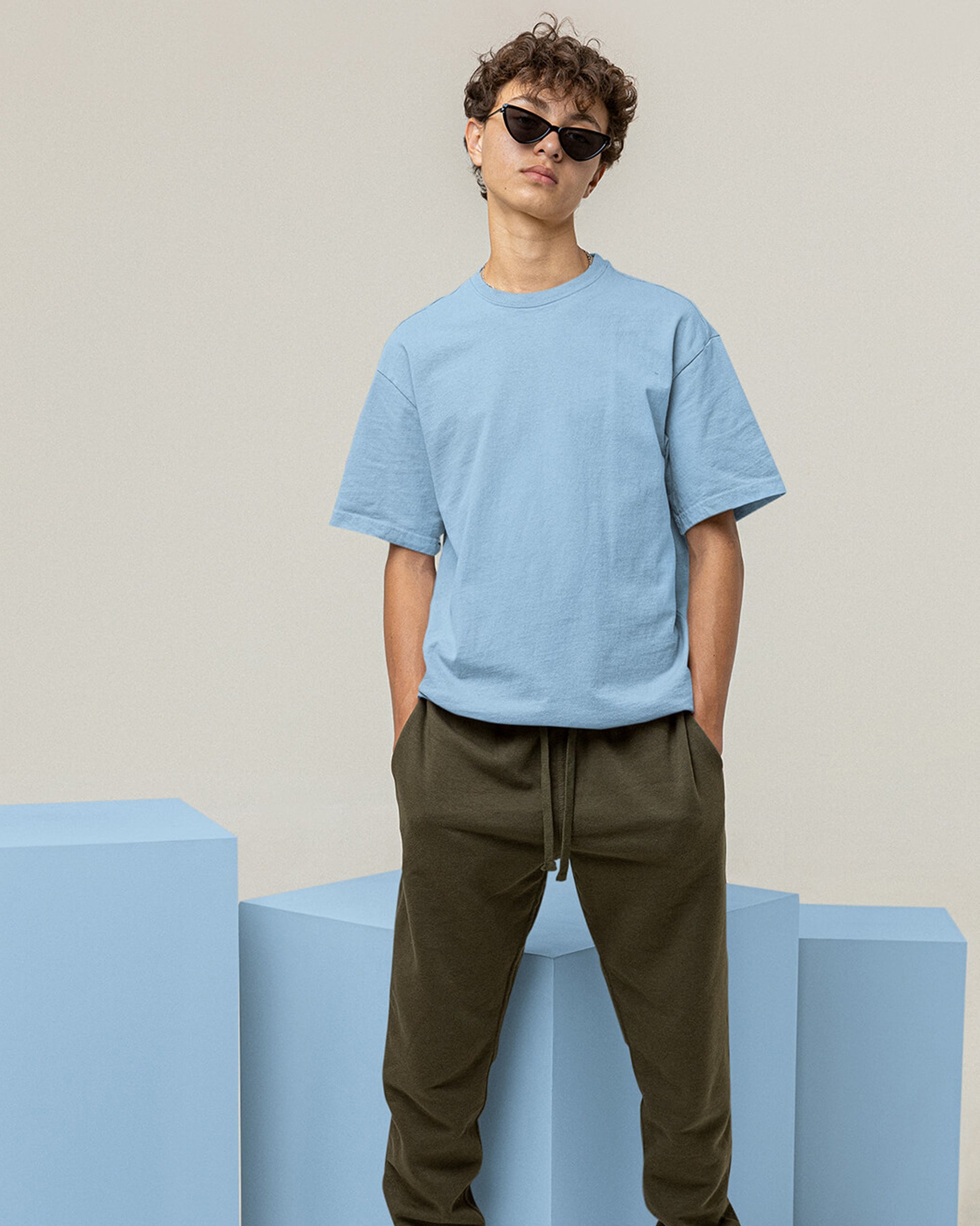 Man in Light Blue Oversized T-Shirt with Front View.