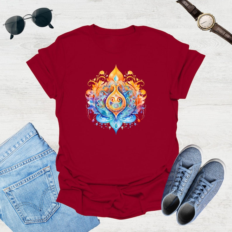 Maroon t-shirt showcases a colorful, psychedelic lotus flower graphic with swirling orange, blue, and yellow details.