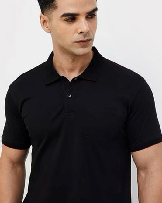 Close-up of a men wearing a black short-sleeved polo t-shirt.