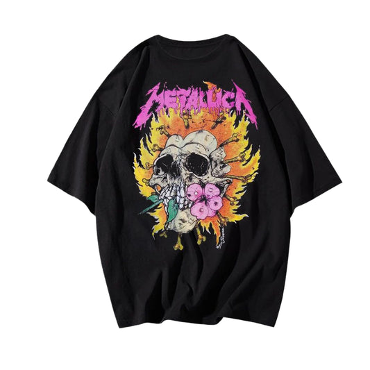 Dark-colored oversized t-shirt with a skull and Metallica logo graphic on the front, featuring flames and crossbones. The skull appears to have a flower in its mouth.
