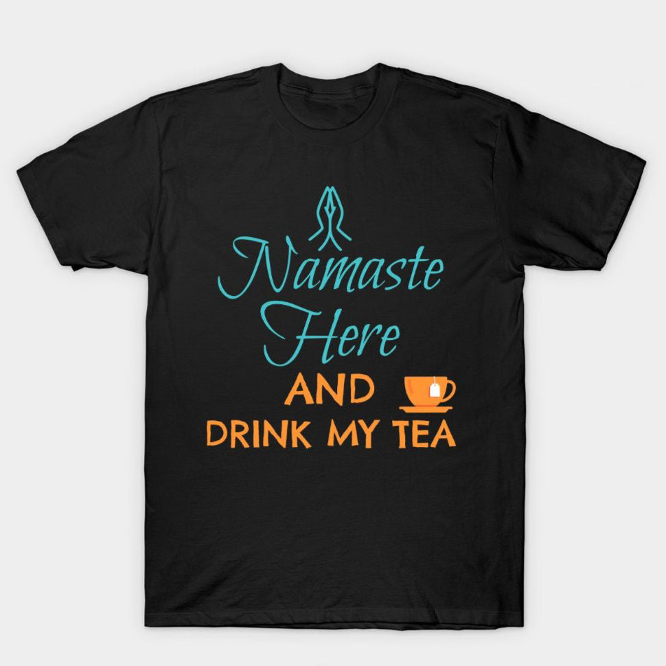 Black t-shirt with "Namaste Here and Drink My Tea" text and a tea cup graphic.  A cultural and relaxing design for tea lovers.
