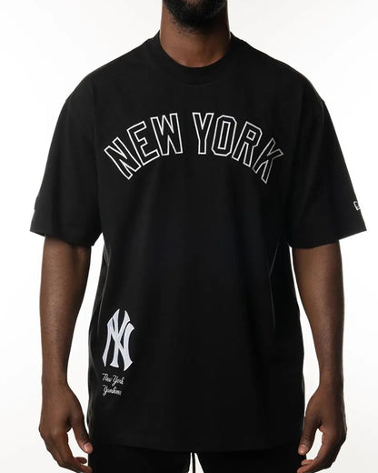 A man wearing a black New York 
Yankees t-shirt _Bold_Style_Team_Pride_front_view