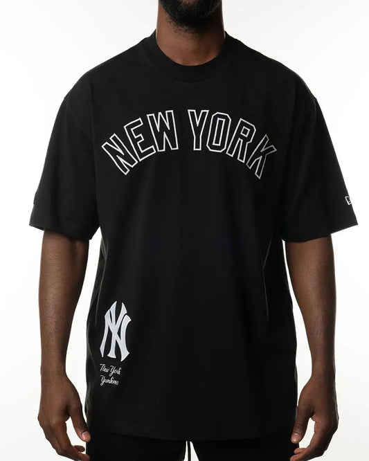 A man wearing a black New York 
Yankees t-shirt _Bold_Style_Team_Pride_front_view