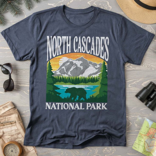 Blue t-shirt with "North Cascades National Park" text and a mountain landscape graphic.