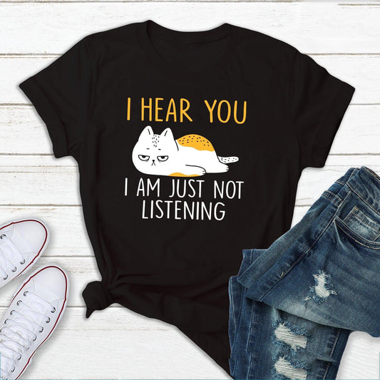 "Not Listening" t-shirt features a distinctive, high-quality print on premium fabric, showcasing our commitment to exceptional design and material excellence.