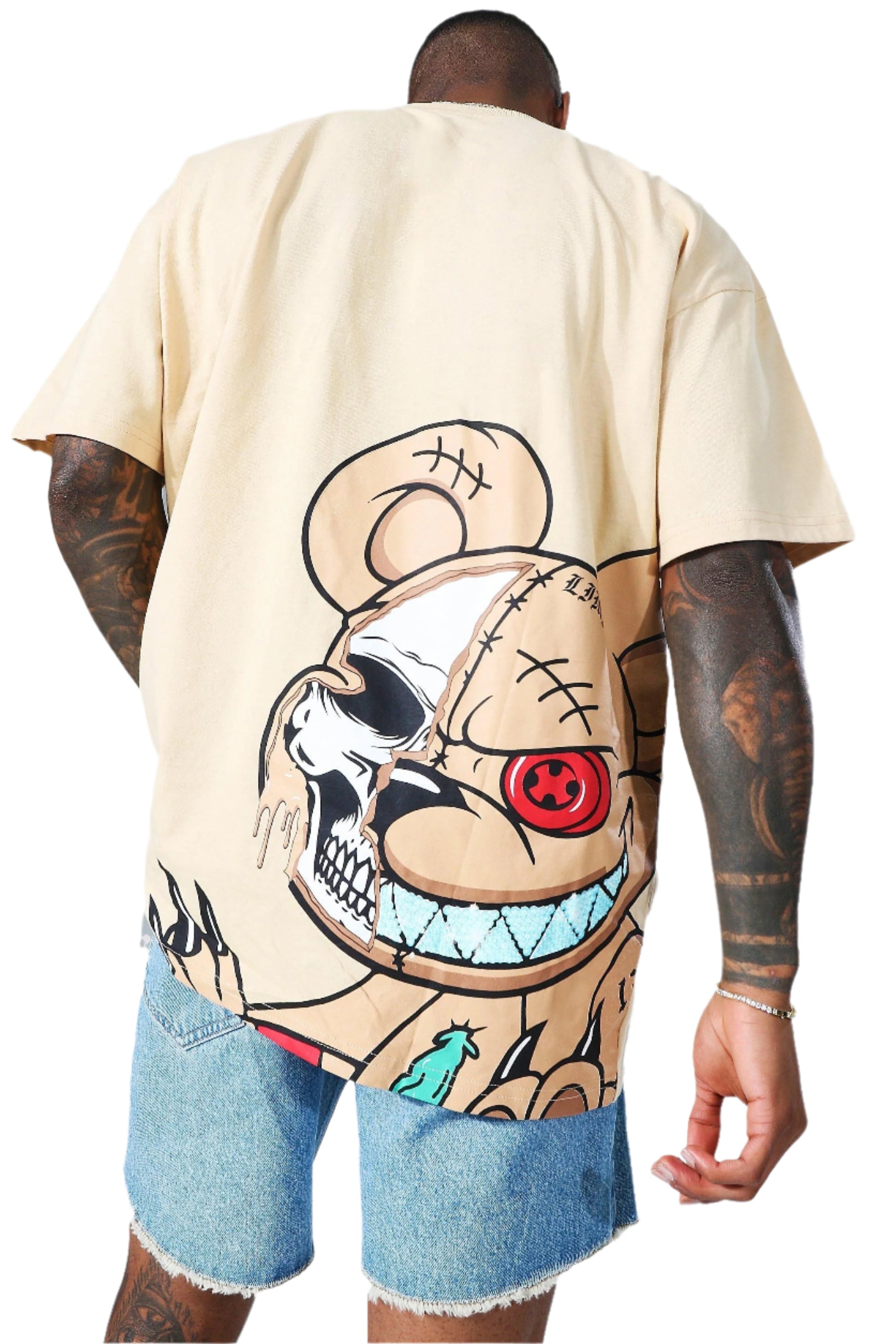 Beige oversized t-shirt with a large graphic of a teddy bear with a skull face, stitches, and a red button eye on the back. 