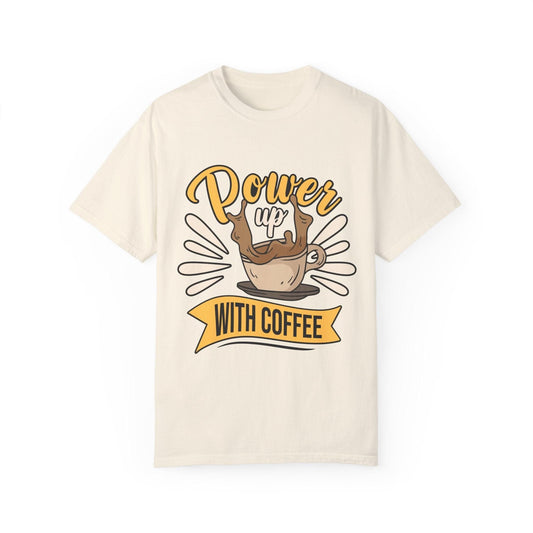Light beige t-shirt with "Power Up With Coffee" text and a coffee cup graphic. A fun design for coffee enthusiasts.