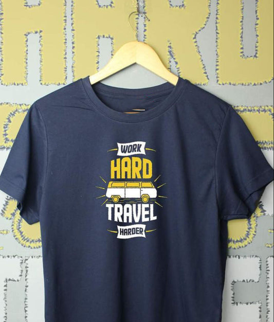 Navy blue t-shirt with a graphic of a camper van and the phrase "Work Hard Travel Harder".