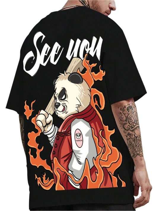 Black oversize t-shirt with "See You" text in a stylized font, a panda graphic holding a baseball bat, and flame-like designs surrounding the panda. The panda is wearing a red jacket with a "Panda" logo patch.
