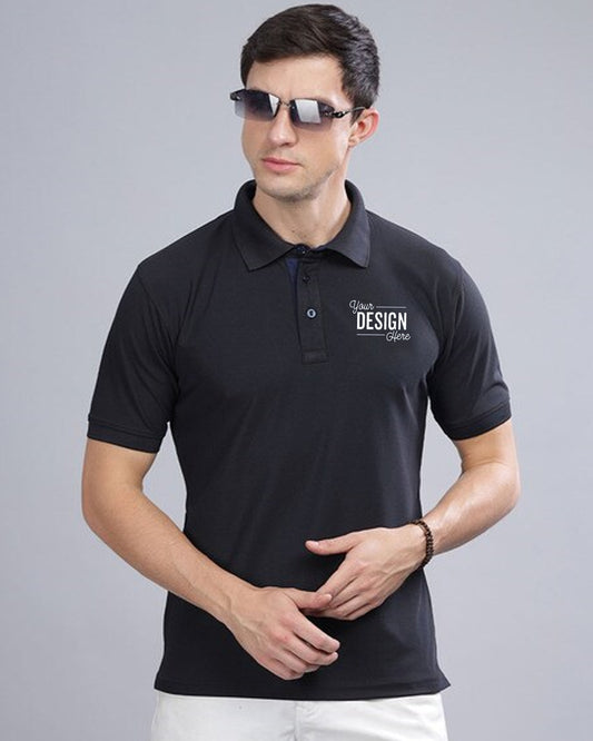 A man wearing  and a black polo t-shirt with the text "Your Design Here" is shown.