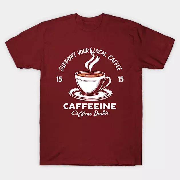 Maroon t-shirt with "Support Your Local Caffee" text and a coffee cup graphic. A stylish design for coffee enthusiasts.