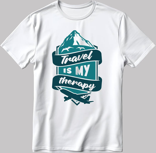  White t-shirt with a teal graphic featuring mountains, an airplane, and the text "Travel IS MY therapy".