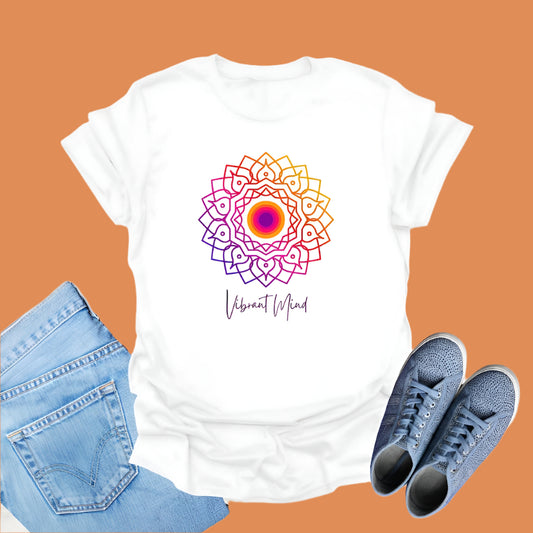 White t-shirt displays a colorful gradient mandala graphic and the text "Vibrant Mind" in cursive.