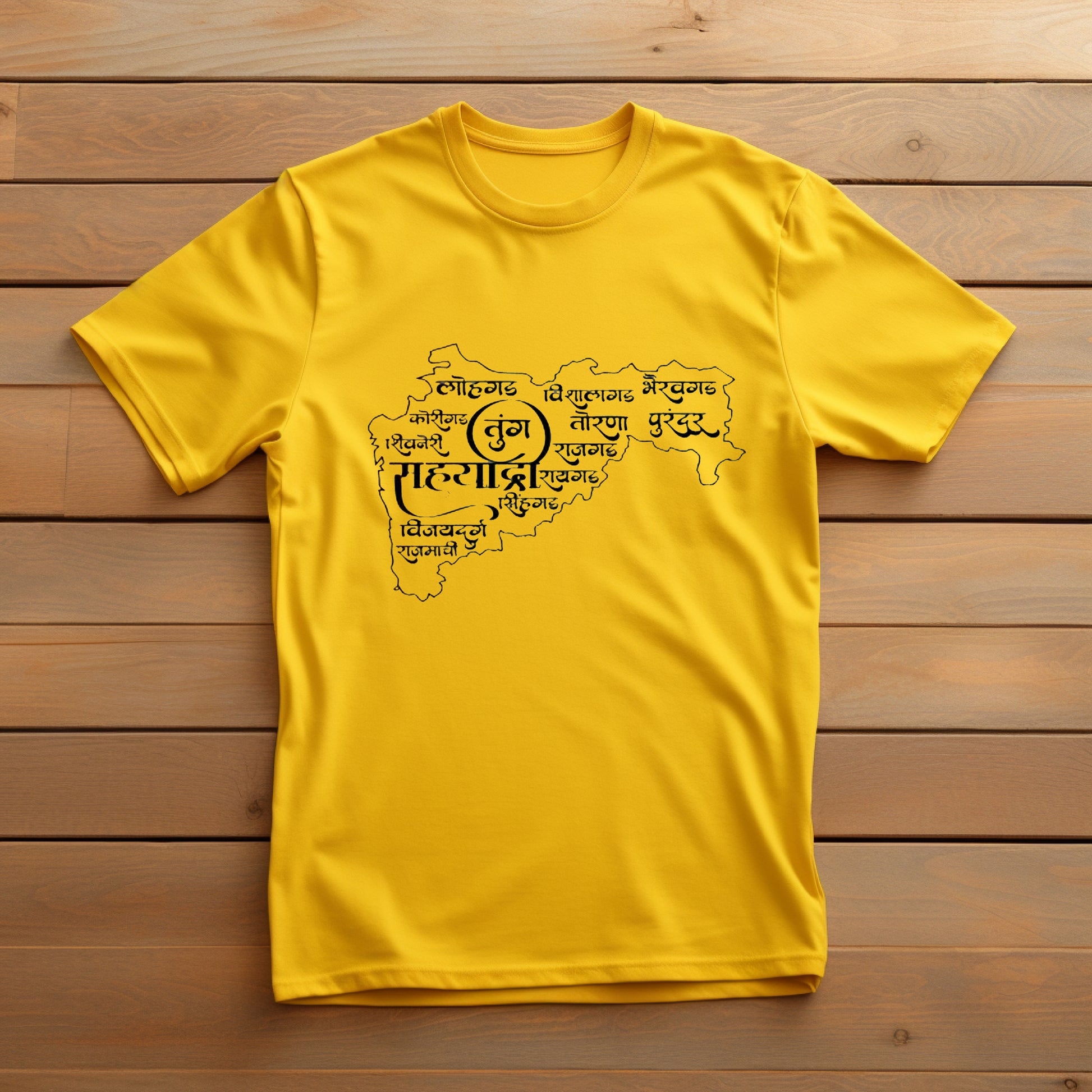  Bright yellow t-shirt displaying a black outline map of Maharashtra with names of forts written in Marathi.