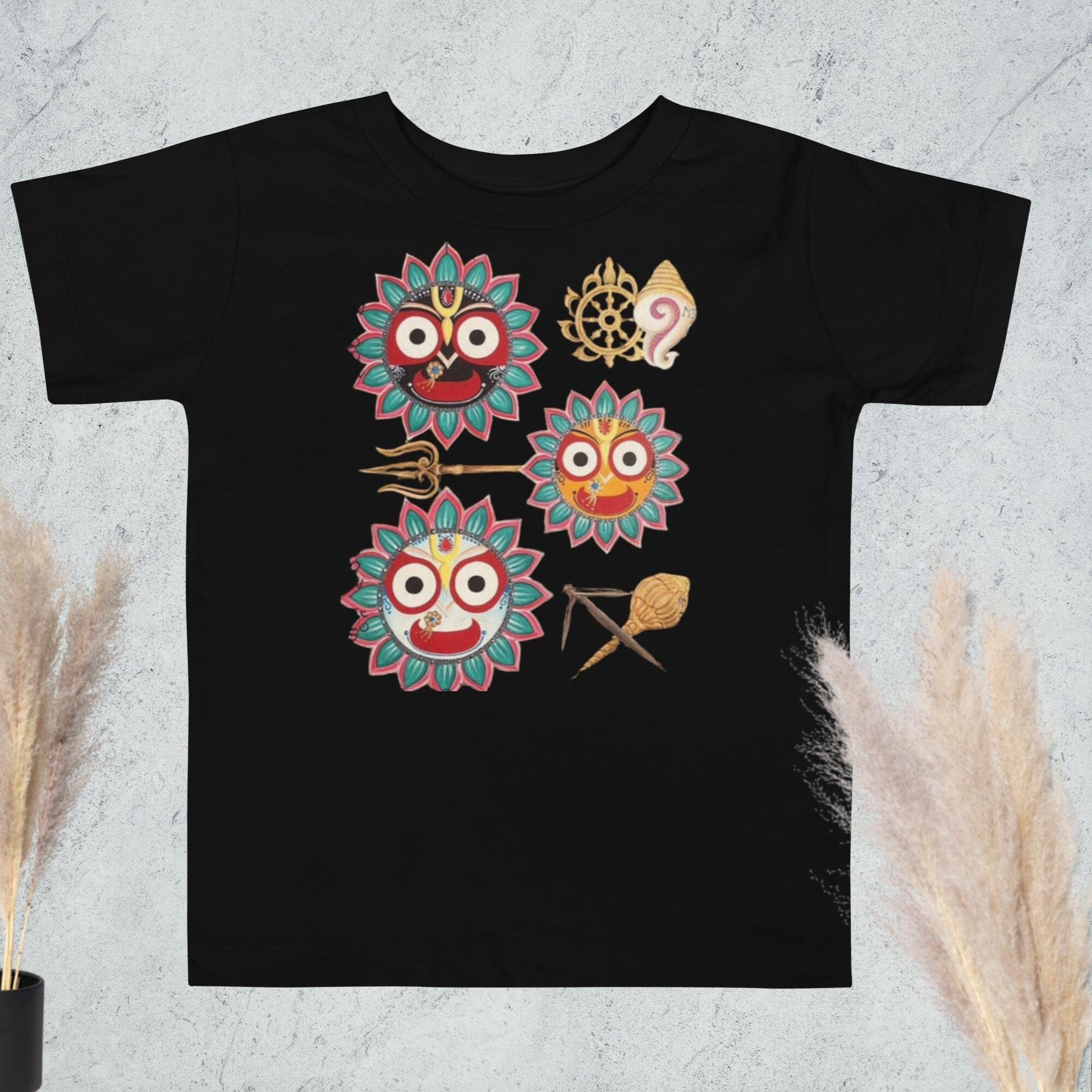 A black t-shirt featuring Jagannath's eyes and divine symbols, representing love, power, and grace.