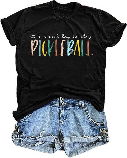 Black t-shirt with "It's a good day to play Pickleball" in colorful text.