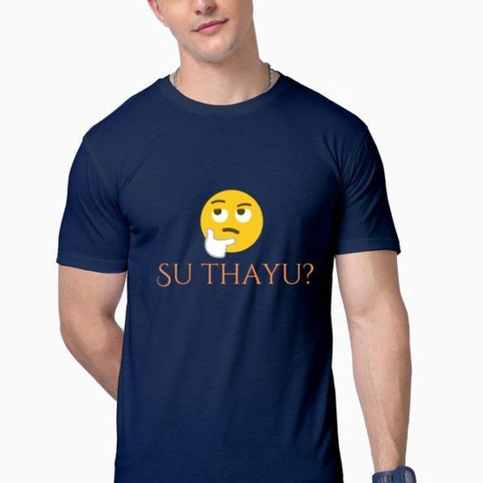 Navy blue t-shirt with a yellow thinking face emoji (🤔) above the orange text "SU THAYU?" (What happened?). Cotton blend t-shirts, available in various sizes.