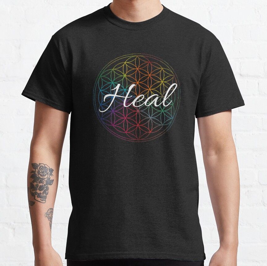 Black T-Shirt with a colorful Flower of Life pattern and the word "Heal" written in white script in the center.