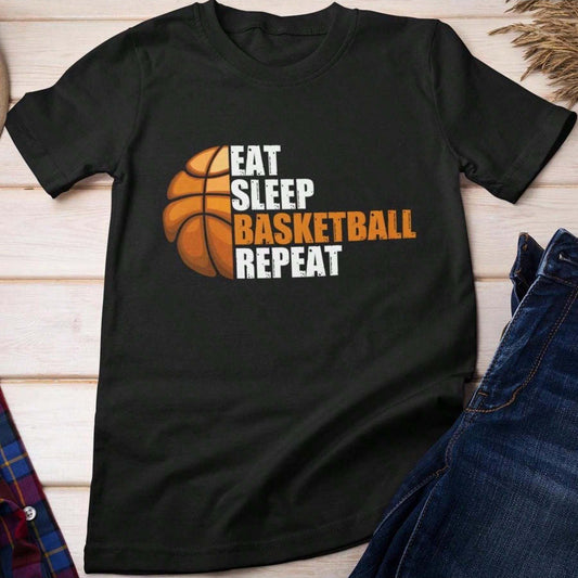 Black t-shirt with "Eat Sleep Basketball Repeat" text and a half-basketball graphic, styled with jeans.