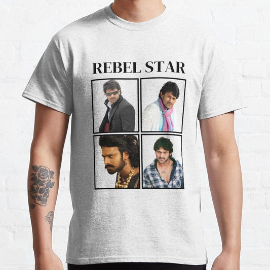 Light gray t-shirt with the English phrase 'REBEL STAR' above four images of Telugu actor Prabhas in various poses.  Tribute to the actor on a comfortable t-shirt.