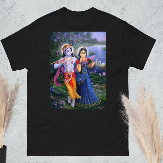 Black jersey tee with a vibrant image of Radha and Krishna in a scenic natural setting.