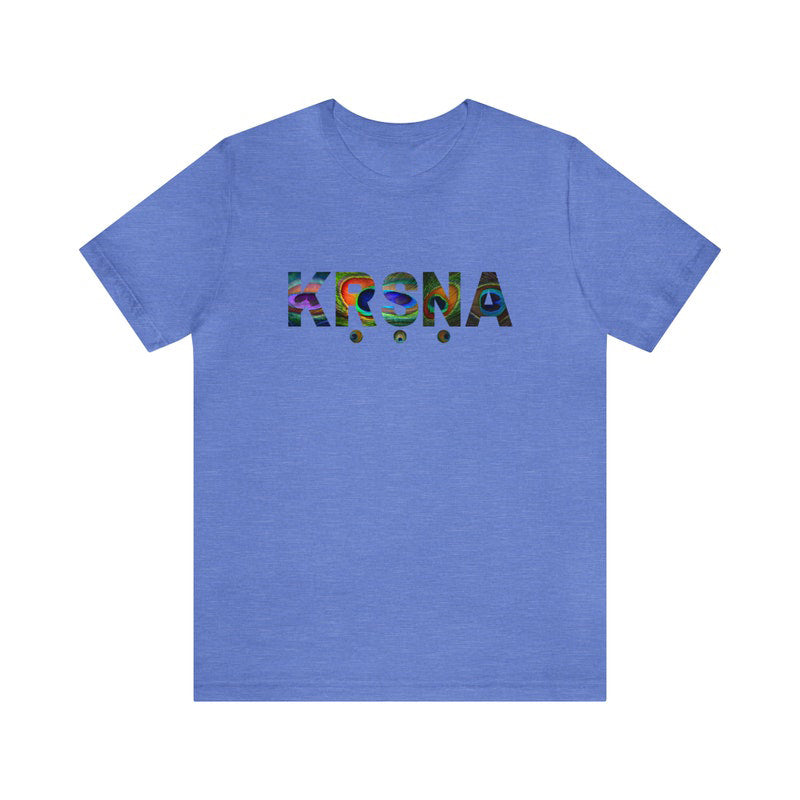 Light blue jersey tee with "KRSNA" text in a vibrant, multi-colored, abstract design.
