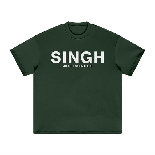 A dark green t-shirt with "Singh" and "Akali Essentials," representing Sikh pride and a timeless sense of style.
